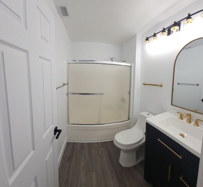 Building Photo - Gorgeous 2 bedroom newly renovated upstairs corner condo in gated community with pool & hill side...