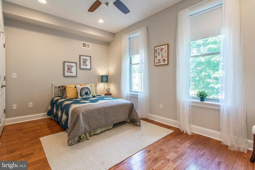 rear room with natural light coming from backyard. - 1333 S Cleveland St