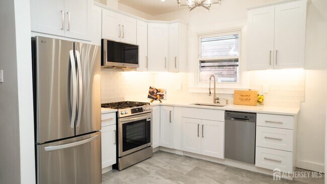 Building Photo - 65-65 Poe Ave