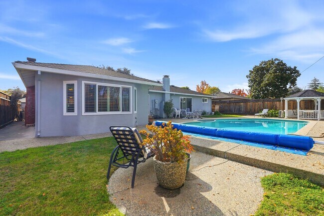 Building Photo - One-of-a-Kind Home with Pool, Gazebo, and Sunken Conversation Pit!