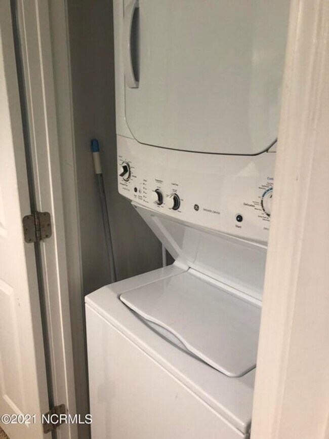 Building Photo - FULLY FURNISHED CONDO in sought-after Sea Trail subdivision!