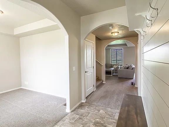 Building Photo - Beautiful 4BR, 2.5BTH, 3-Story Home in Post Falls