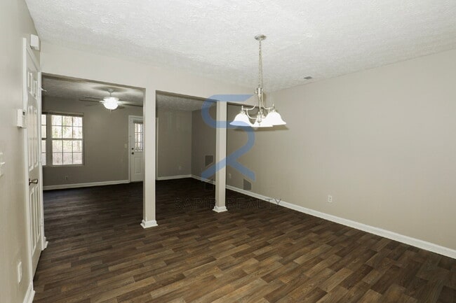 Building Photo - Move in before February 28th and choose your reward: a $250 Amazon Gift Card or a 55" Smart TV!