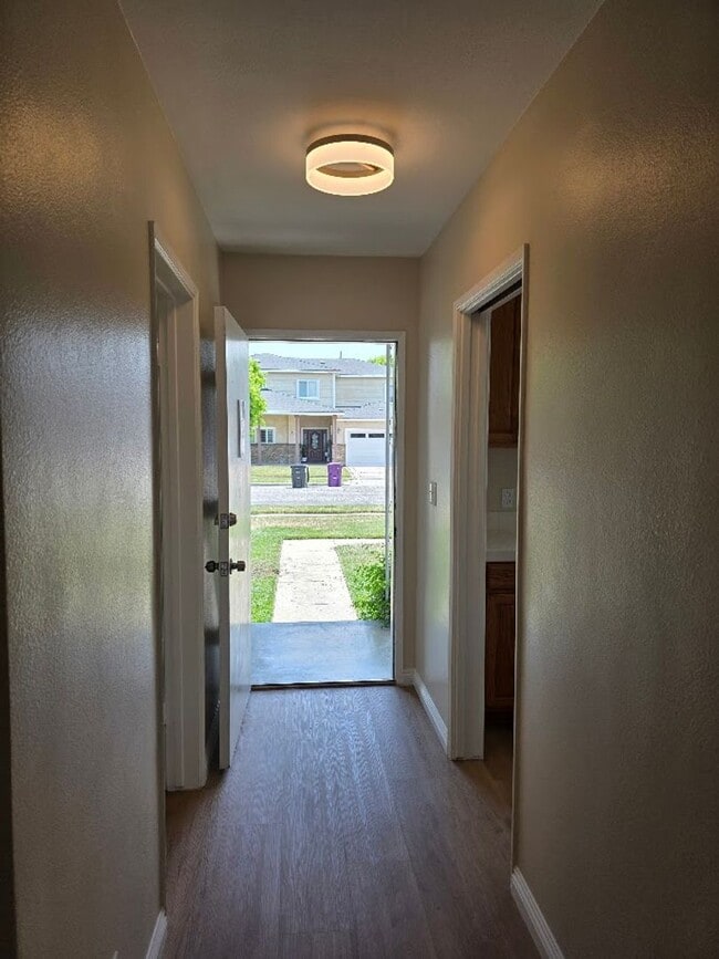 Building Photo - TURNKEY-RENT READY SPACIOUS 2BD/2BA HOME, 2-CAR GARAGE WITH AN AUTOMATIC ROLL-UP DOOR, LARGE COVE...