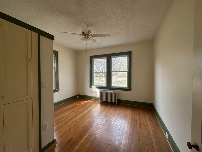 Building Photo - House in Bedford with Lot of Outdoor Space.