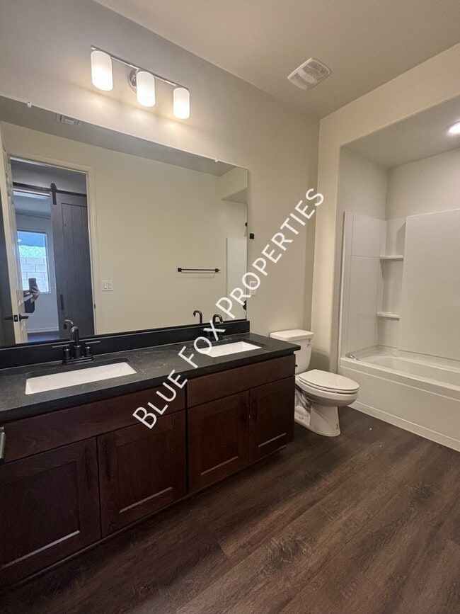 Building Photo - 8454 N Lone Ranger Rd