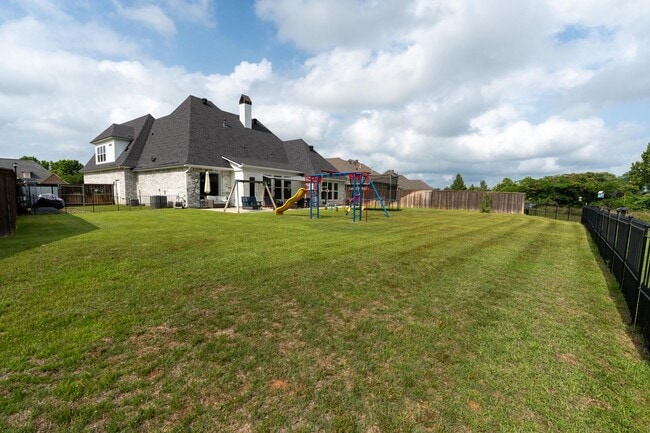 Building Photo - Waterfront Dream in Island Park | 4BR Retreat with Fire Pit, Flex Space & Backyard Oasis