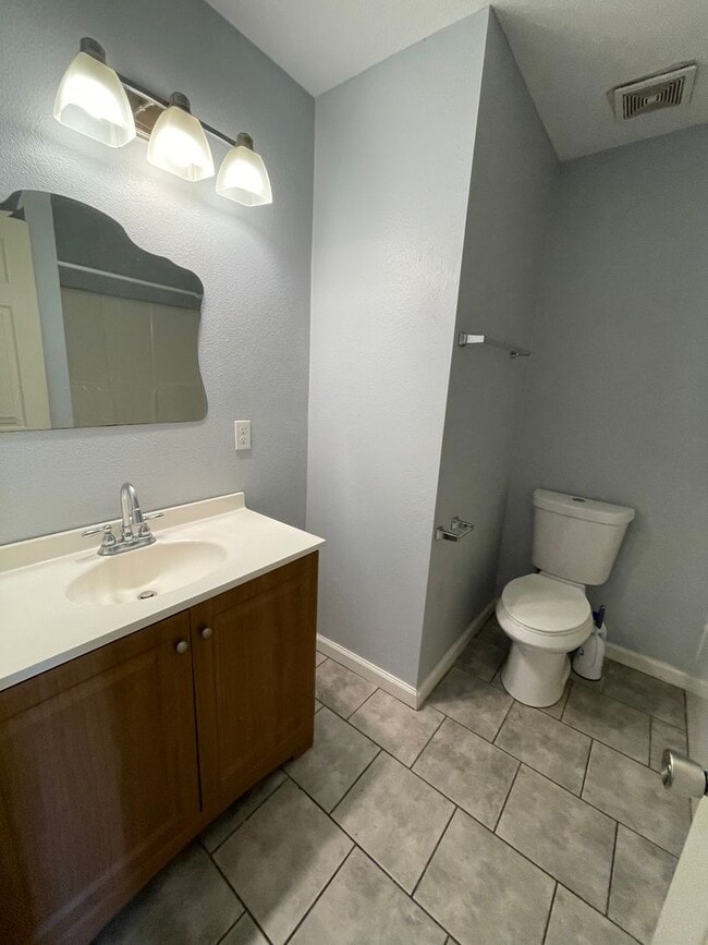 Building Photo - Open floor plan, four-bedroom two-bathroom with washer and dryer