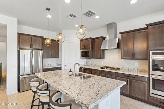 Building Photo - 10812 E Tesla Ave