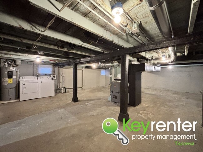 Building Photo - Newly Remodeled 2-Bedroom, 2-Bath Tacoma Home with Finished Basement, Large Backyard, and Detache...