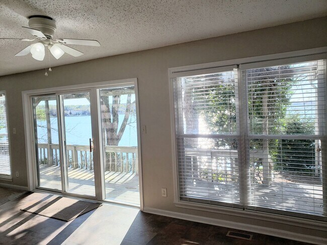 Building Photo - Enjoy Lakefront Luxury Year Round! $250 Of...