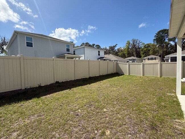Building Photo - Spacious 4-Bedroom Modern Home in Oaks Preserve – Perfect Gainesville Location
