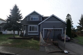 Building Photo - AVAILABLE NOW: Spacious 4 bdrm, 3 bath home in Cedar Ridge Development!