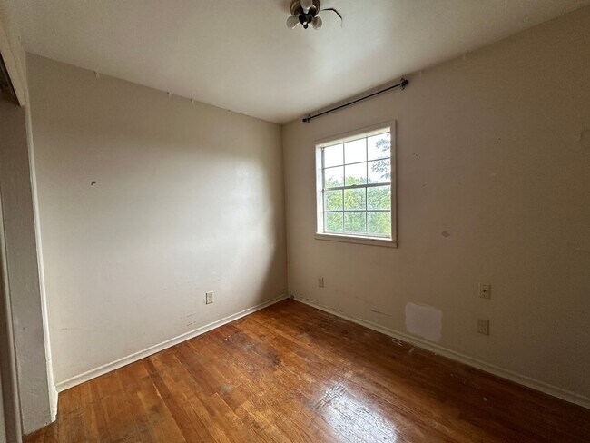 Building Photo - Available July 1st***Welcome to this charming 4-bedroom, 2-bathroom home located in the heart of ...