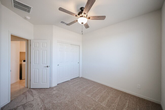 Building Photo - New 4 Bedroom + Den Home in Asante Community