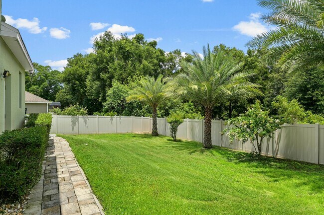 Building Photo - Expansive 4 bedroom, 3 bath remodeled home in gated community