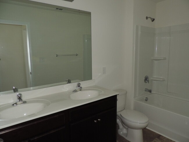 Building Photo - New, 4 bedroom home in the Hallstead commu...