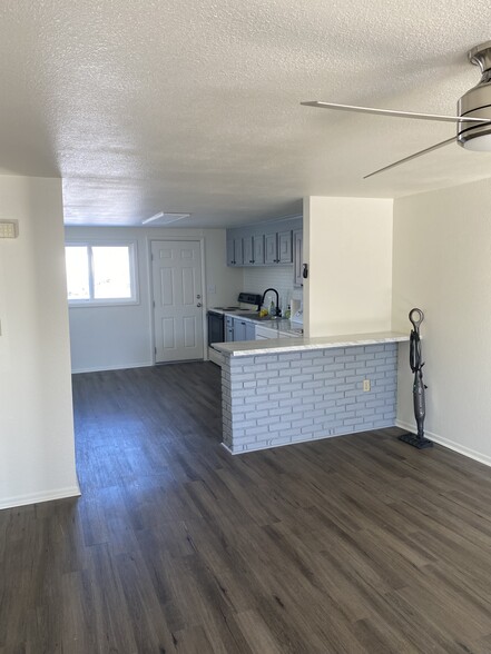 Living Room looking in to kitchen - 7655 W 61st Ave