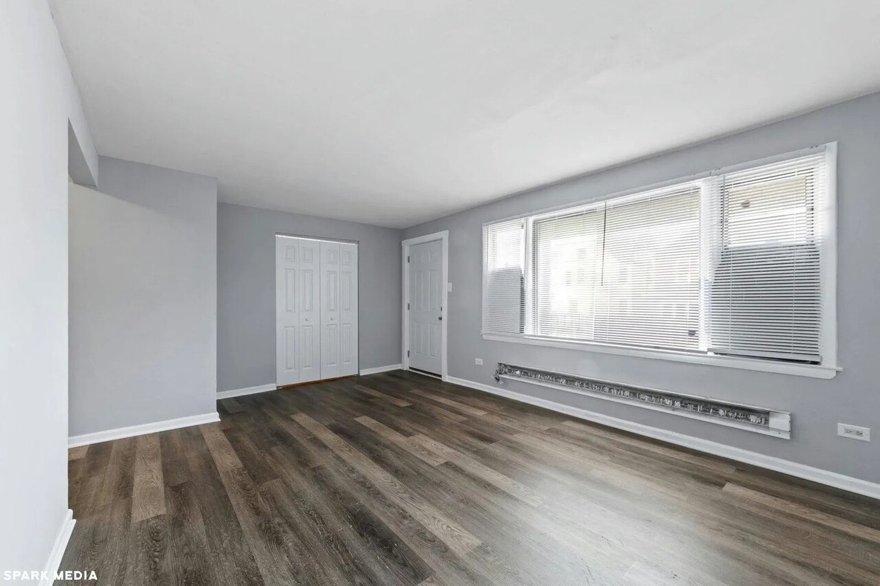 Building Photo - 7617 S Colfax Ave