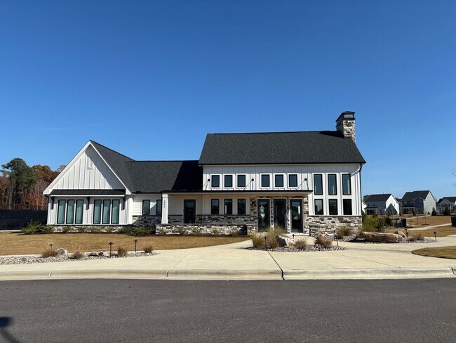 Building Photo - Beautiful 3 Bed+Bonus+2 Car Garage Townhome in New Wake Forest Community