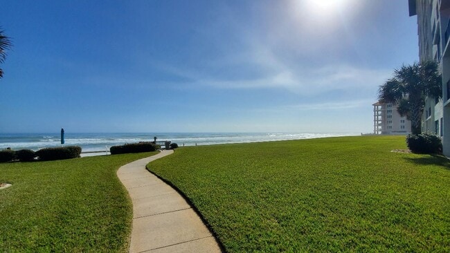 Building Photo - Oceanfront Poolside 2/2 Condo