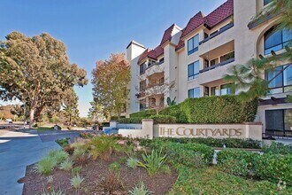 Building Photo - Furnished  2BR/1.5 BA +  Condominium @ The...
