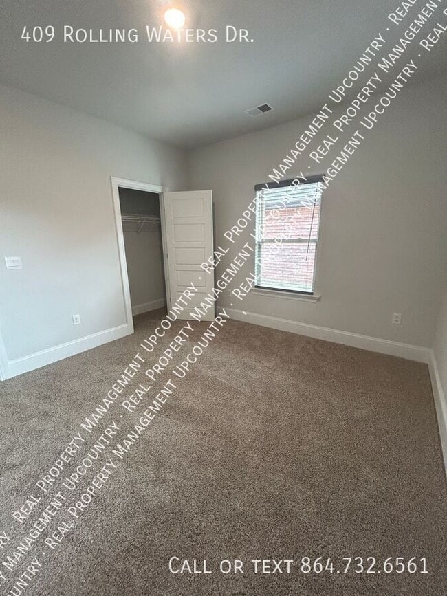 Building Photo - 409 Rolling Waters Dr