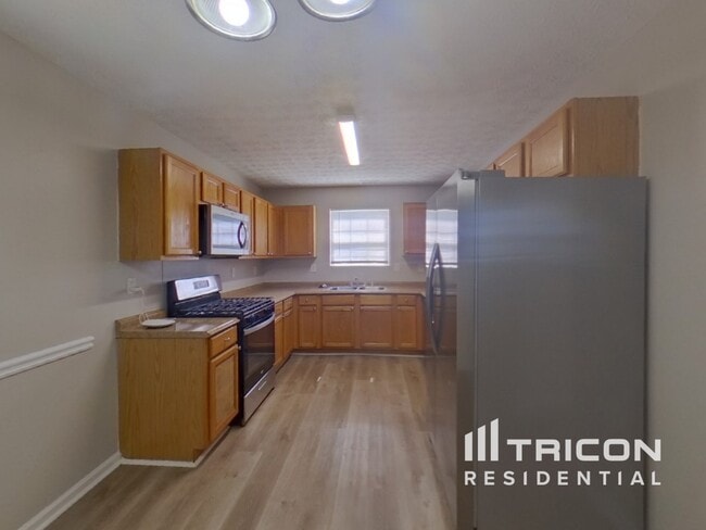 Building Photo - 6090 Flagstaf Walk