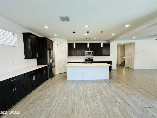 Building Photo - 2460 E Athena Ave