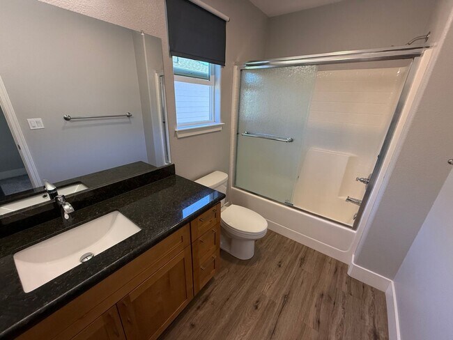 Building Photo - NEW PHOTOS! Two-level home located in Coff...