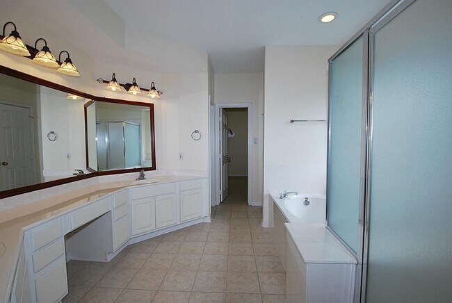 Building Photo - 9106 Memorial Pines Way