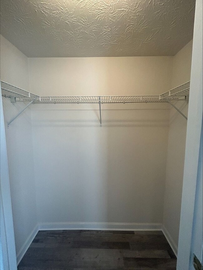 Building Photo - Large 3 Bedroom Townhome Available For Short-Term Lease! Brand New Flooring and Paint!