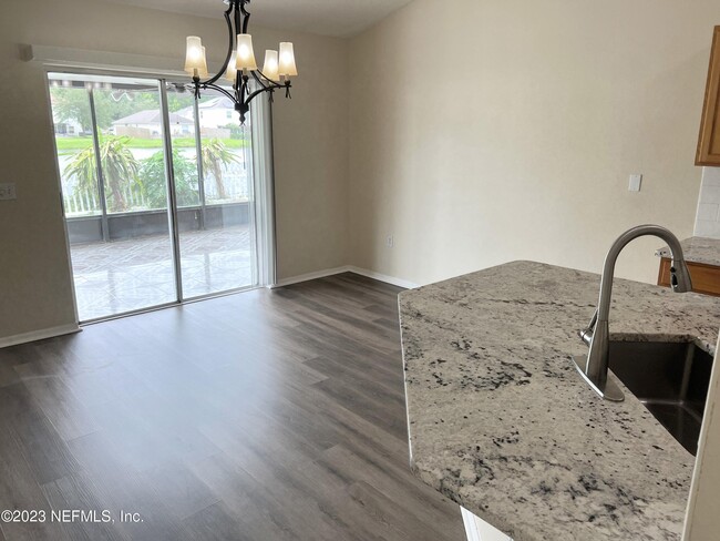 Building Photo - 6580 Gentle Oaks Dr N