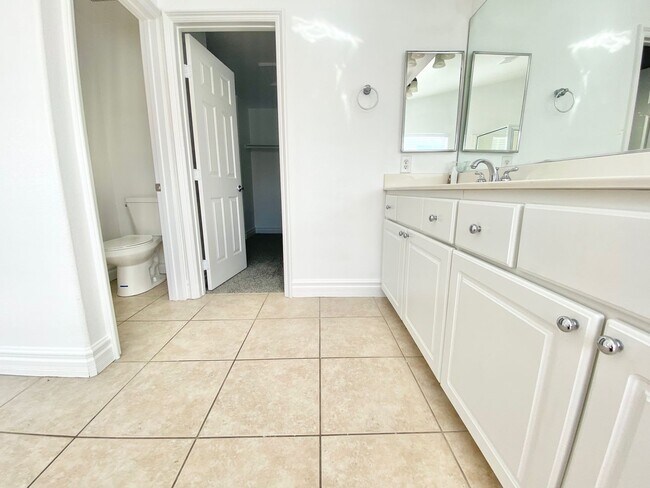 Building Photo - STUNNING 2 STORY HOME IN A GUARD GATED COM...