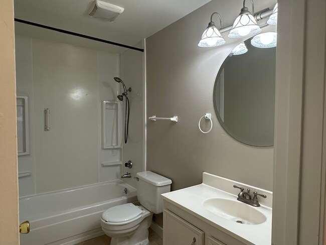 Building Photo - Spacious & Stylish 3BD Home with Iconic Stone Fireplace + Soaking Tub