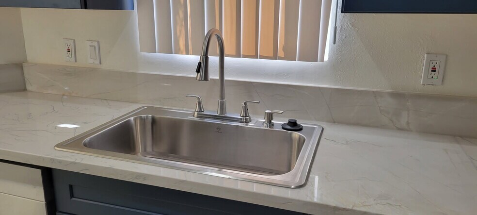 New sink - 5135 Zelzah Ave