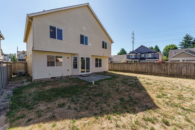 Building Photo - Your Next Home Awaits! 4BR/2.5BA with Fenc...