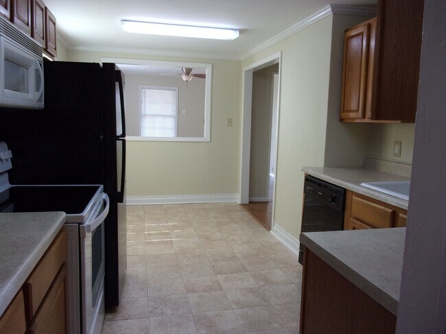 Building Photo - Recently Updated with Large Backyard and Deck