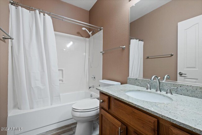 Building Photo - 5623 E Gelding Dr