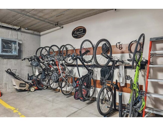 Shared bike rack in garage. - 3125 Inglewood Ave S