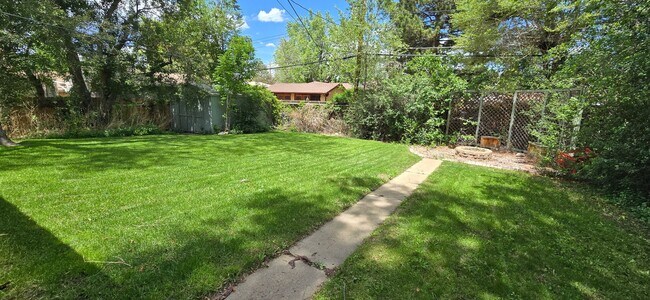 Building Photo - Spacious Ranch-Style 5BR Home w/ Finished Basement & Large Fenced Yard