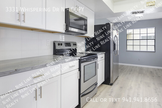 Building Photo - 3331 Whispering Dr N