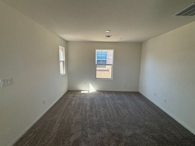 Building Photo - Modern Inspirada Living – 4 Bed Home with Loft & Downstairs Suite