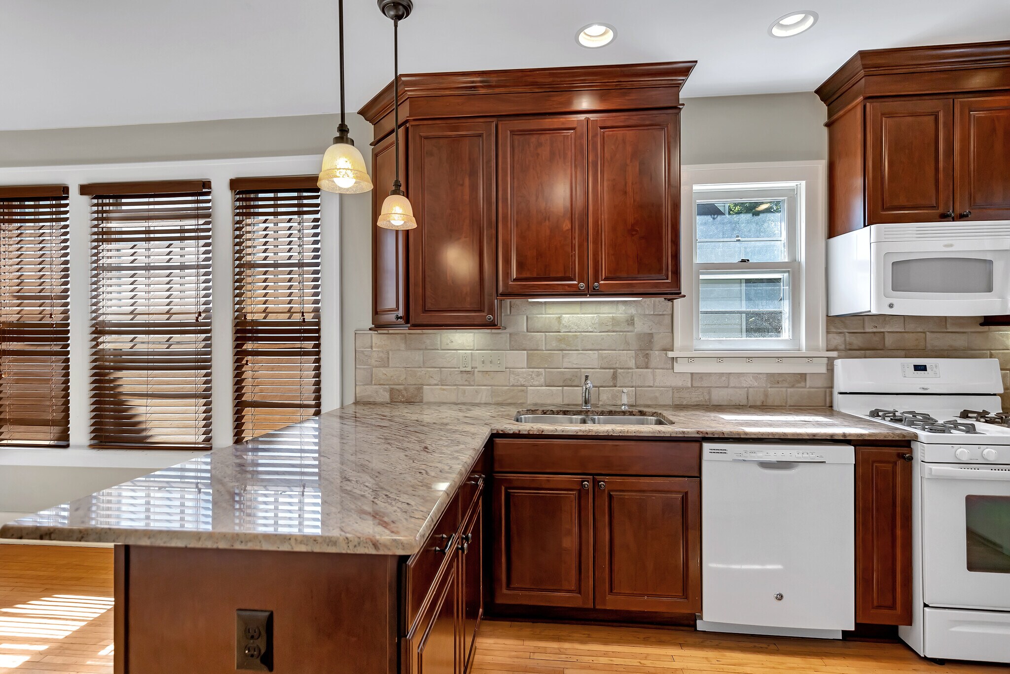 Natural Stone backsplash - 1015 18th Ave SE