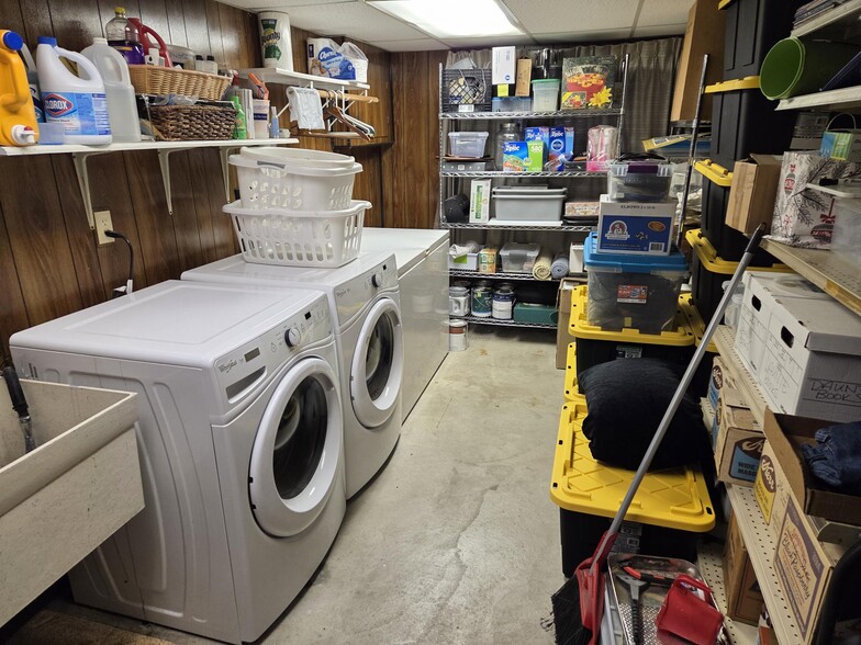 Laundry room with washer/dryer and large chest freezer, lots of storage! - 8460 Red Oak Dr