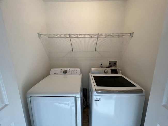 Building Photo - Bright 2BR 2.5BA Home w/ Community Pool/Playground Access • Full-Size Appliances • 1-Car Garage i...