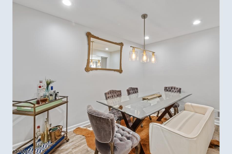 Dinning Room with Seating for 6 and a Bar Cart - 31 Howard Ct