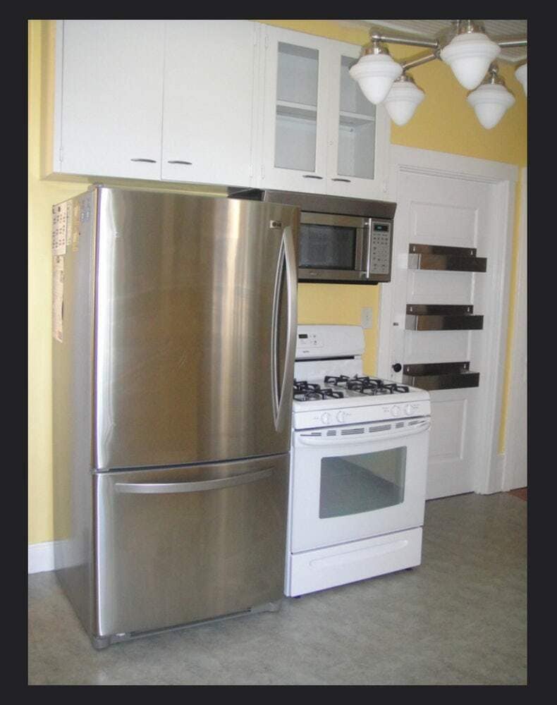 Stainless fridge with bottom freezer, gas stove, over the range microwave - 3284 Dawson Street