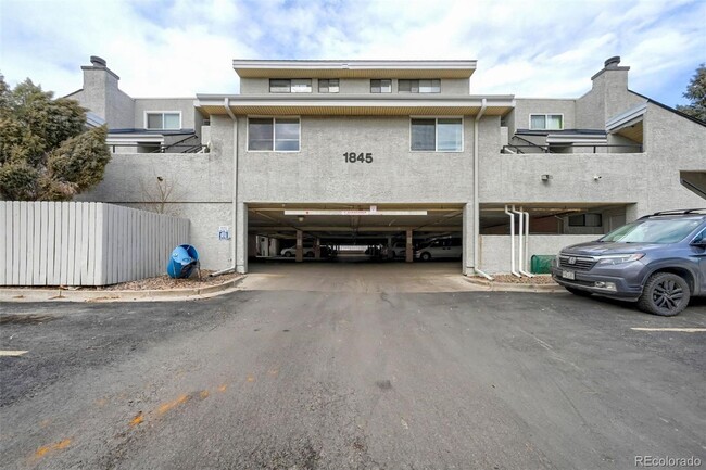 Building Photo - NICE 2-BDRM CONDO WITH FIREPLACE, GARAGE, ...