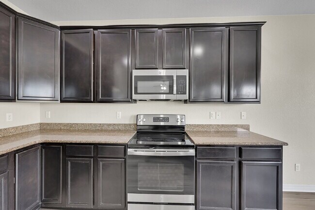 Building Photo - $2,650.00 - 6 Bedrooms, 3.5 Bathrooms, Single Family Home in Colorado Springs with Fenced Yard!